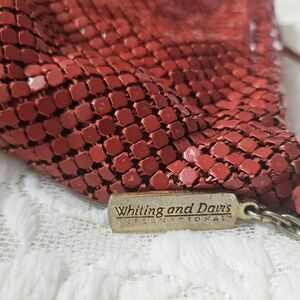 vibrant red, metallic mesh purse.